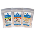 Three packaged products labeled GF Traditional Oats, GF Quick Oats, and GF Organic Oats, arranged side by side.