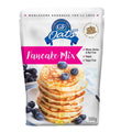 GF Oats Pancake Mix featuring an image of a stack of pancakes with blueberries on top, alongside branding and product information stating it is gluten-free, dairy-free, vegan, and sugar-free.
